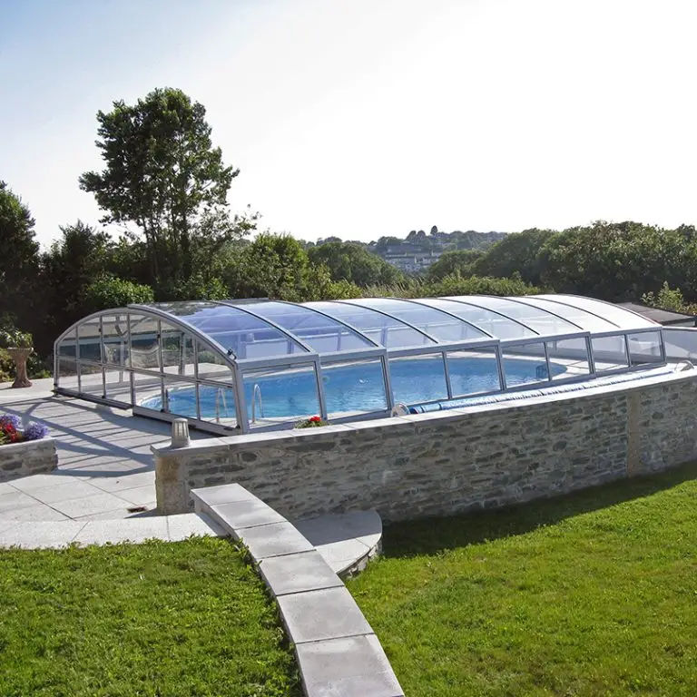 Alukov telescopic pool enclosure, offering adjustable coverage for year-round swimming and protection.